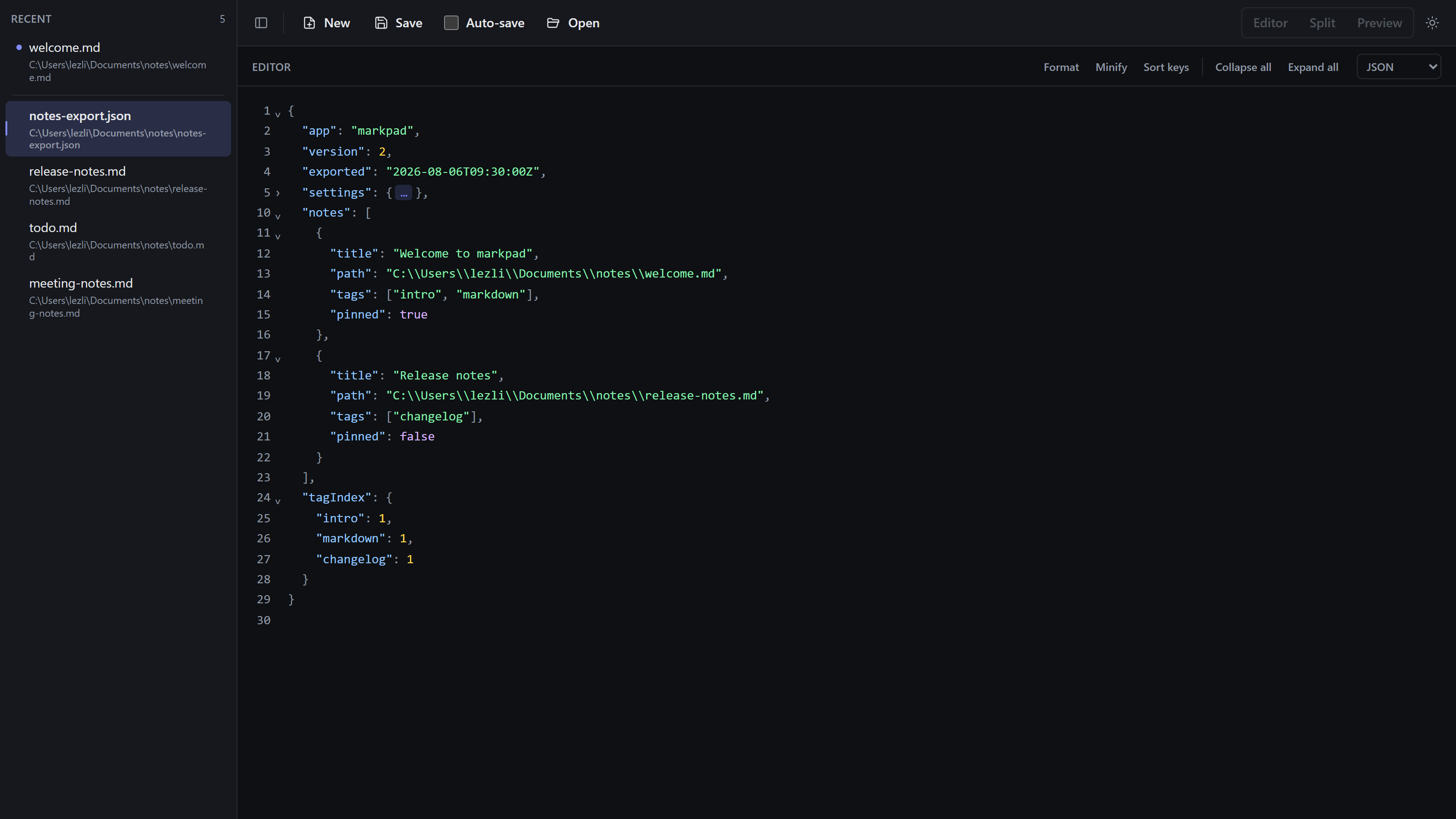 MarkPad editing JSON: the editor fills the window with line numbers and a folded settings object, the pane header offers Format, Minify, Sort keys, Collapse all, and Expand all next to the JSON language toggle, and the view-mode switcher is disabled while the preview steps aside